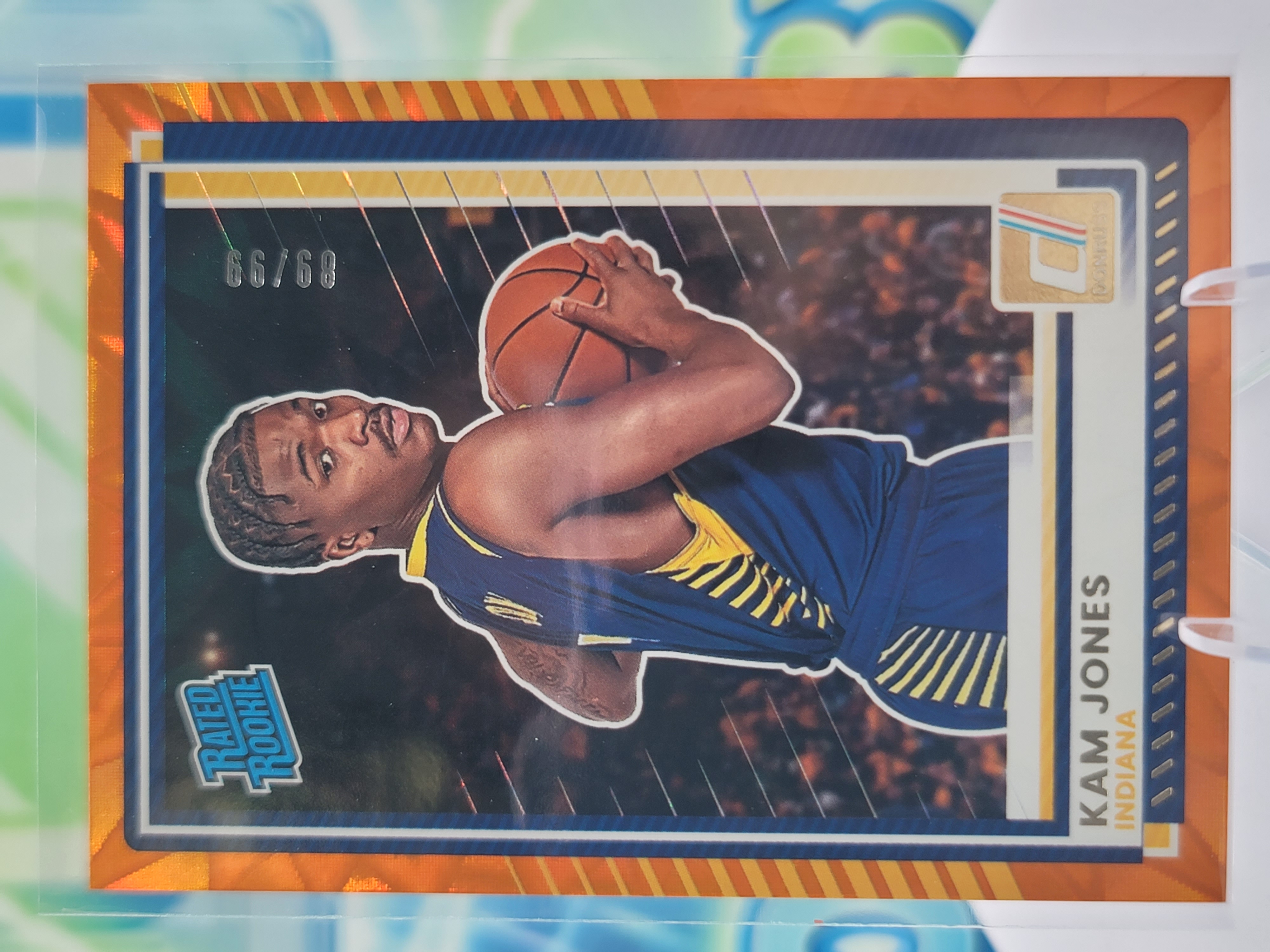 2026 Panini Donruss Kam Jones — 2026 Panini Donruss Rated Rookie Orange Explosion Kam Jones Rookie #89 of 99