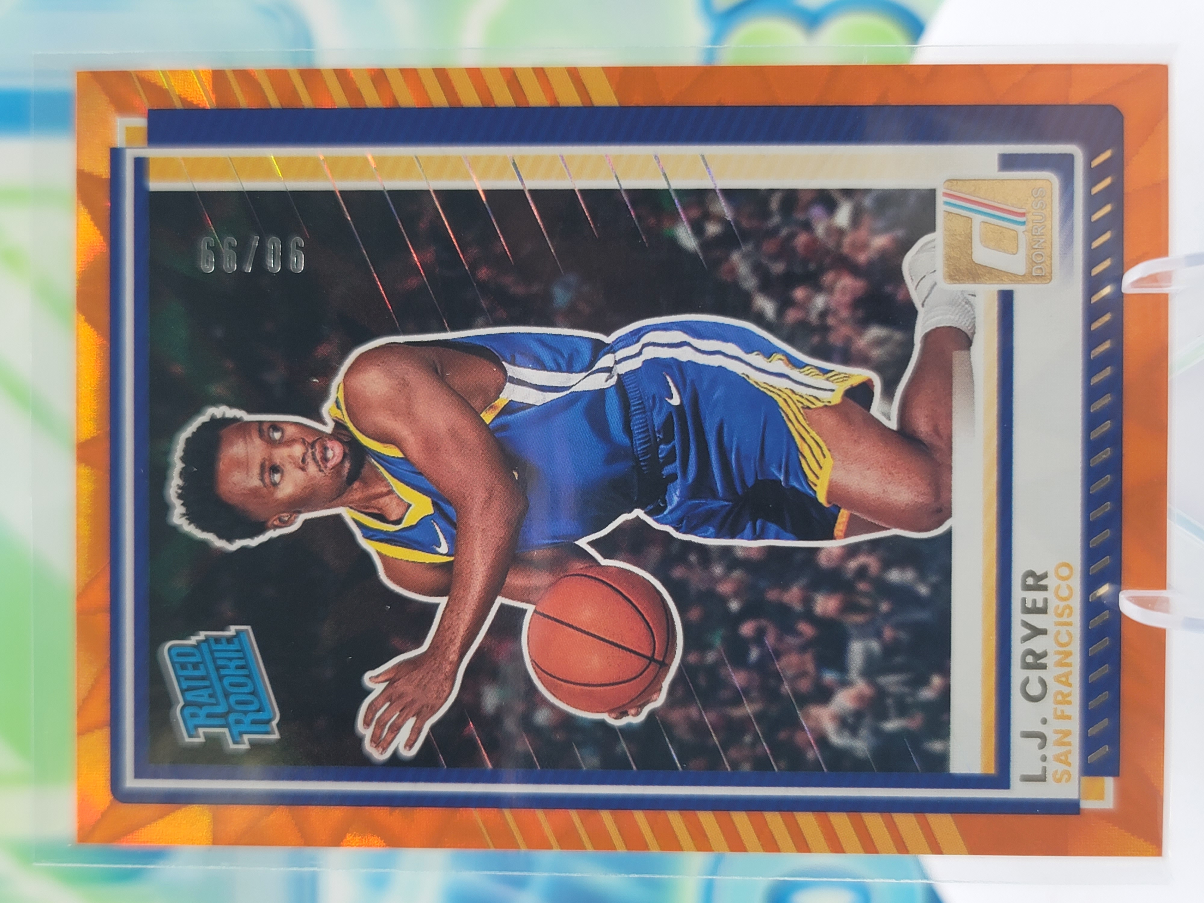 2026 Panini Donruss LJ Cryer — 2026 Panini Donruss Rated Rookie Orange Explosion LJ Cryer Rookie #90 of 99