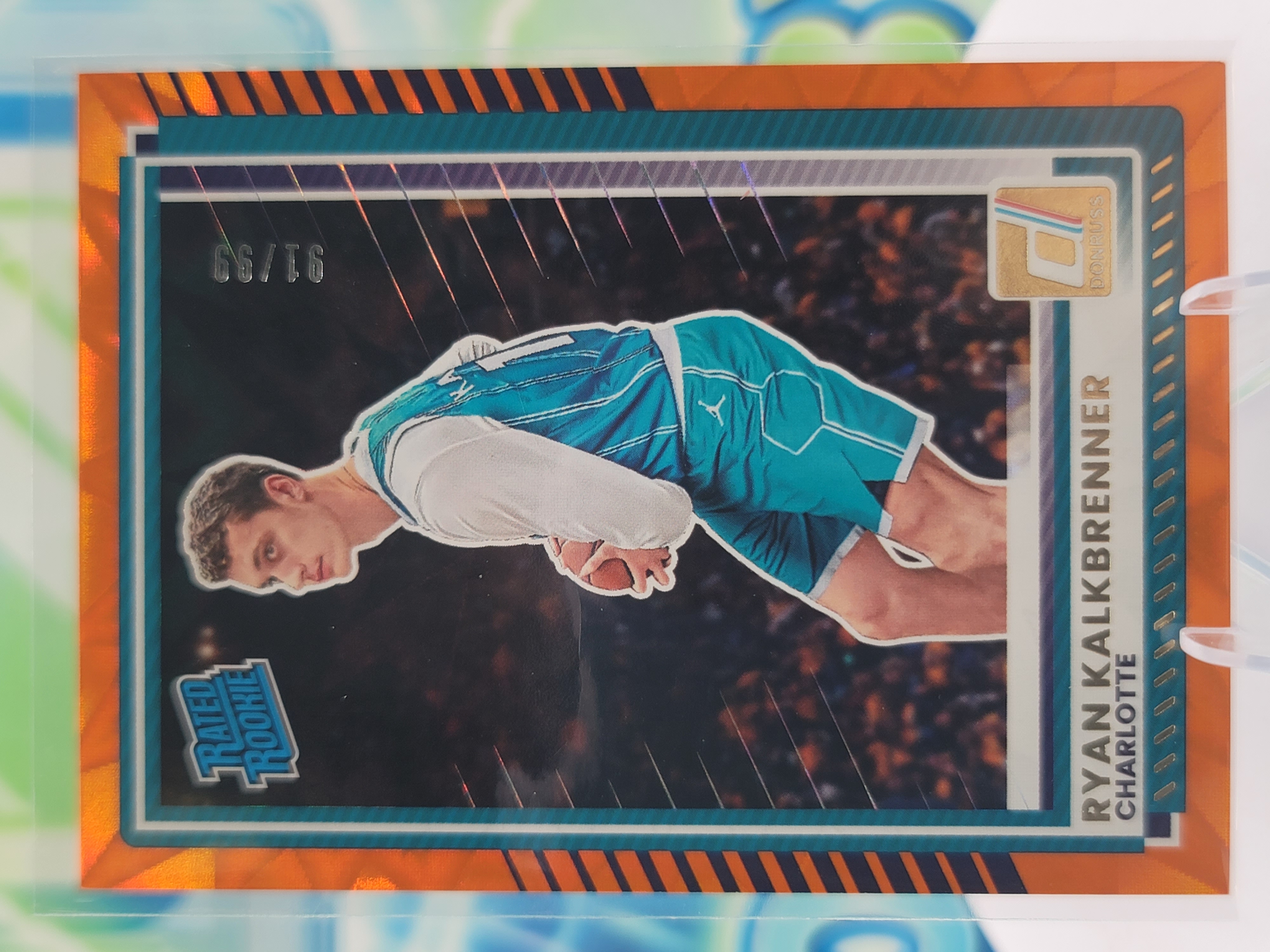 2026 Panini Donruss Ryan Kalkbrenner — 2026 Panini Donruss Rated Rookie Orange Explosion Ryan Kalkbrenner Rookie #91 of 99