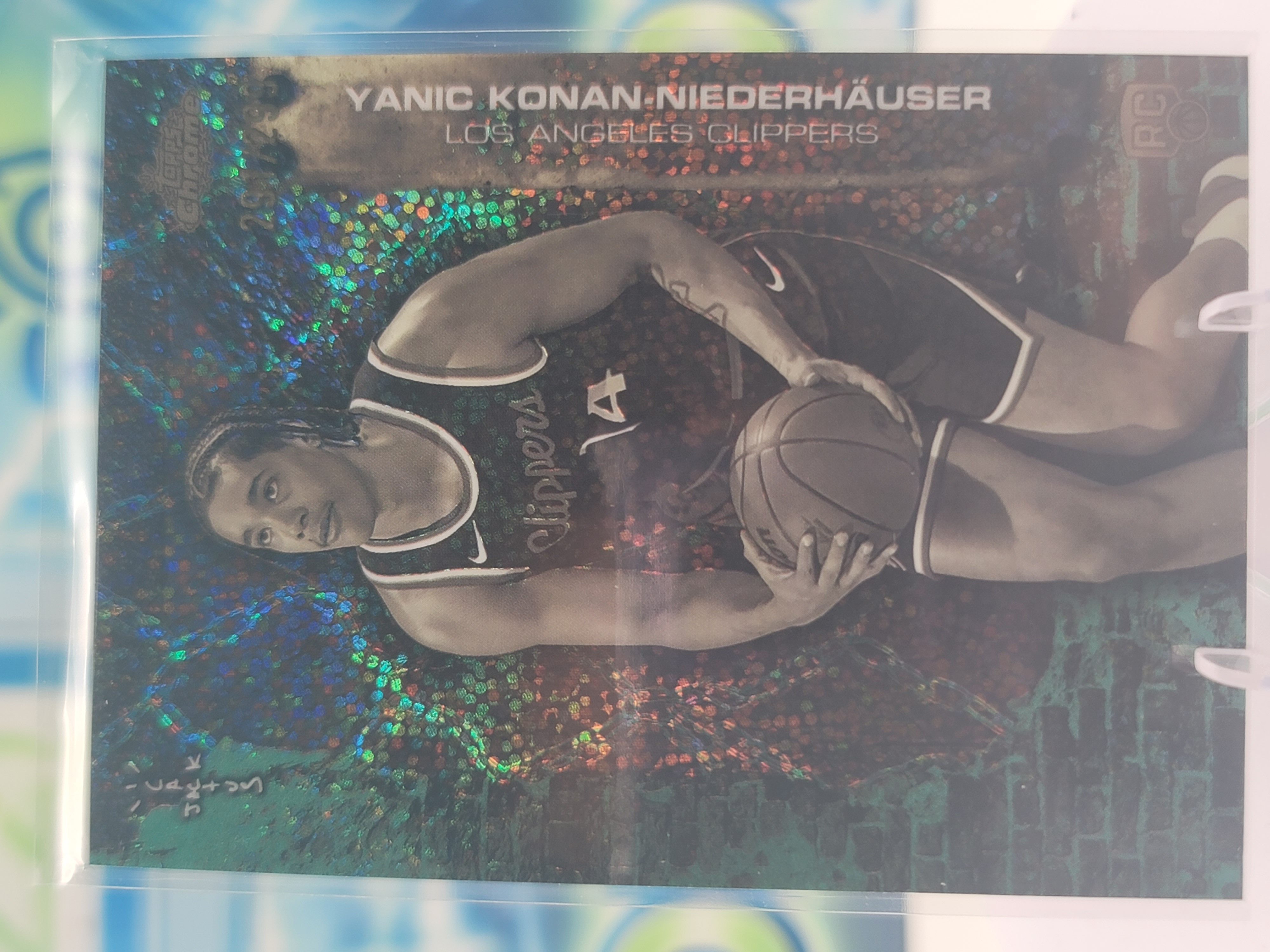 2026 Topps Chrome x Cactus Jack Yanic Konan-Niederhauser — 2026 Topps Chrome x Cactus Jack Teal Speakle Refractor Yanic Konan-Niederhauser Rookie #291 of 299