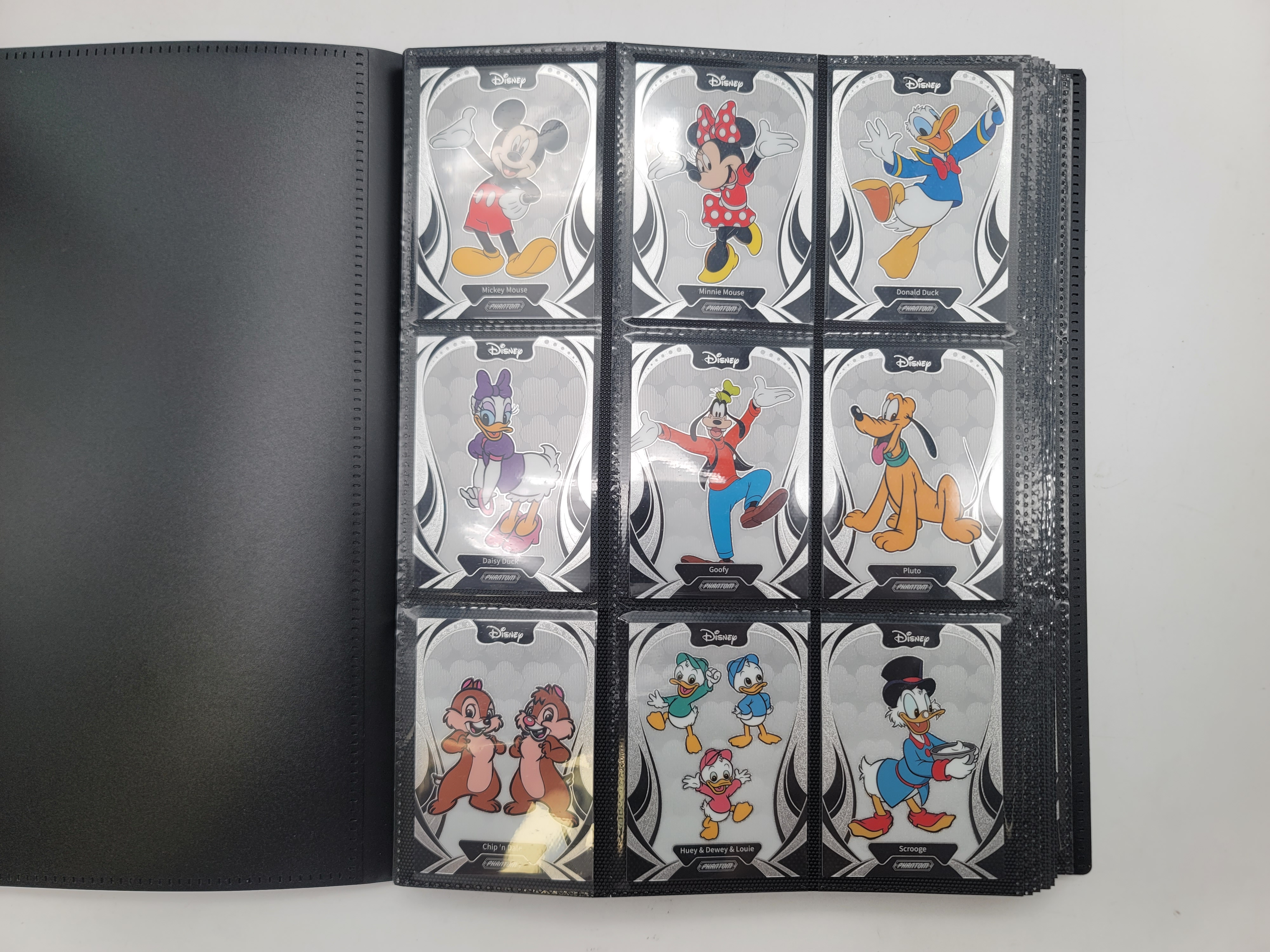 2025 Disney — 2025 Disney LOT of 196 with Binder