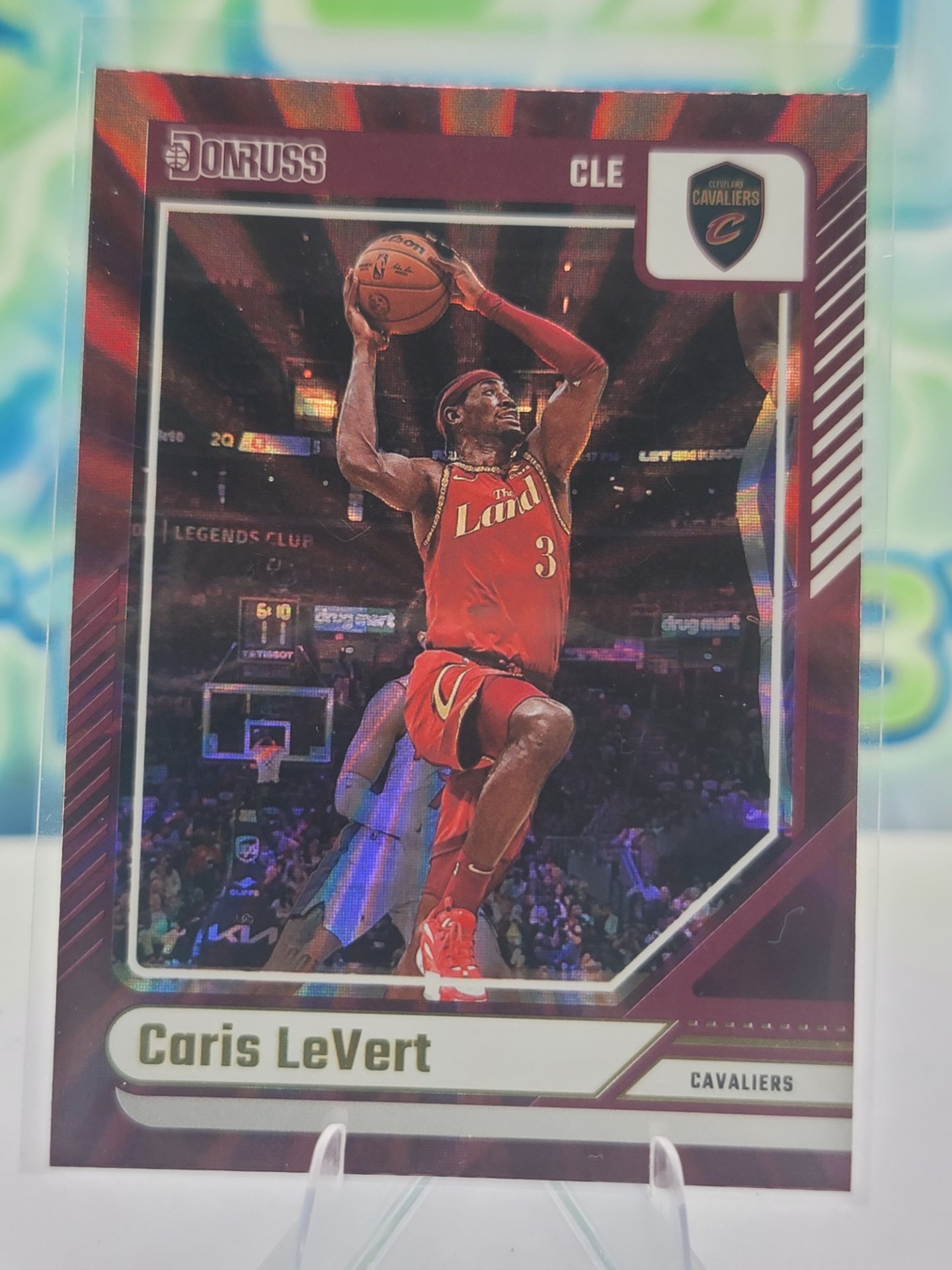 2025 Panini Donruss Caris LeVert — 2025 Panini Donruss International Holo Maroon Laser Caris LeVert