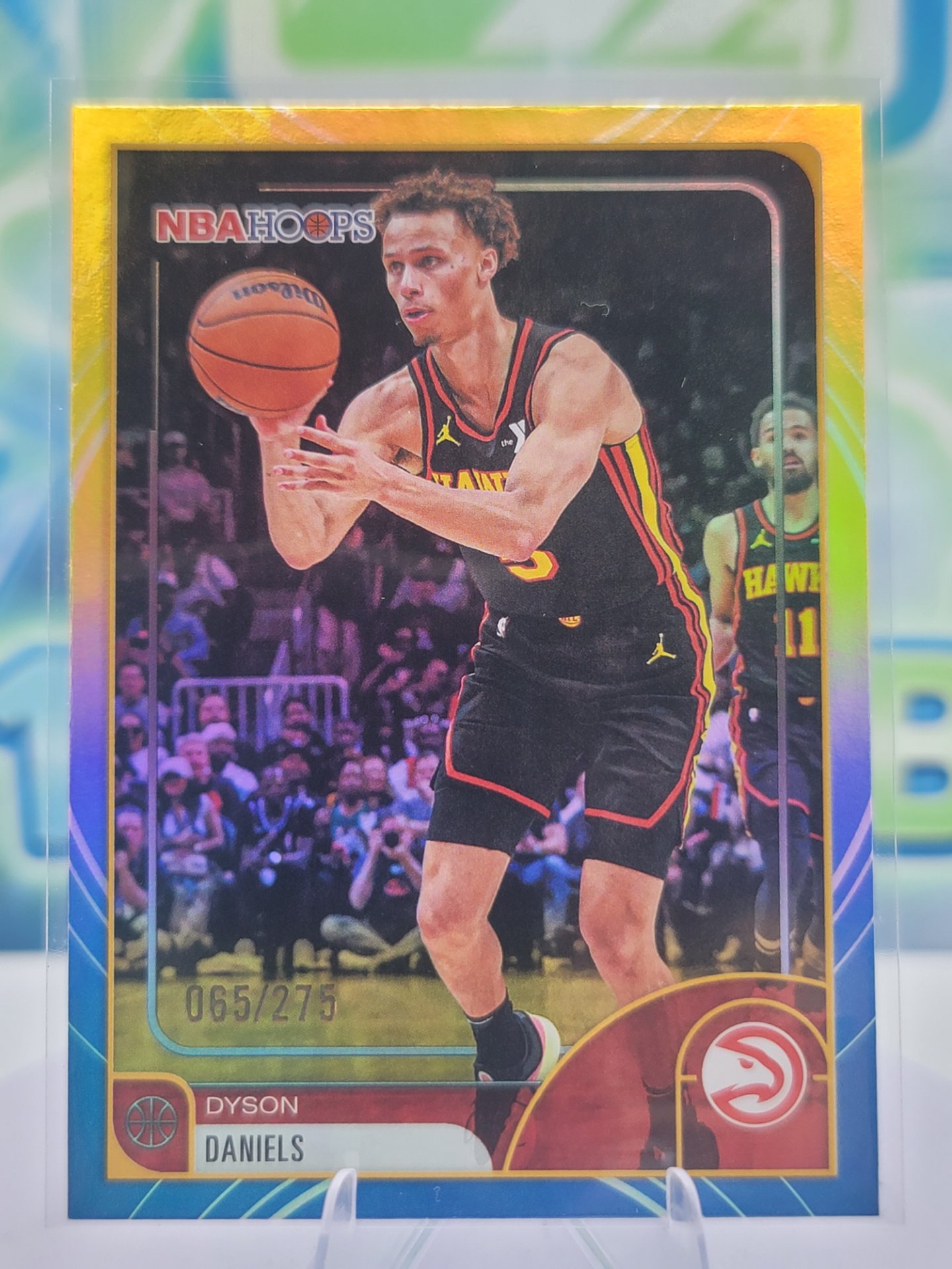 2026 Topps NBA Hoops Dyson Daniels — 2026 Topps NBA Hoops Rainbow Blue and Yellow Dyson Daniels #65 of 275